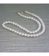 Jade blanco talla esferas facetadas en collar con cierres de plata de ley
