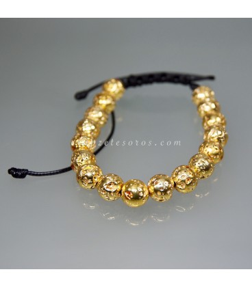 Esferas de lava natural con baño dorado en pulsera ajustable