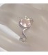 Creación de Cuarzo rosa en anillo de plata de ley 