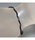 Turmalinas negras talla esferita de 2 mm en pulsera elástica