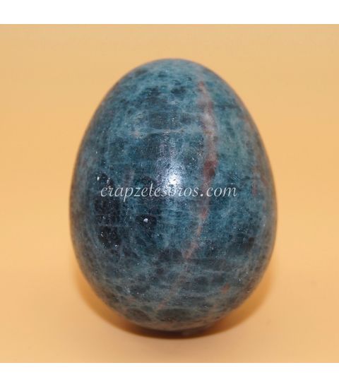 Apatito azul tallado en forma de huevo con peana