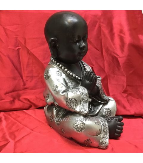 Buda niño plateado meditando 