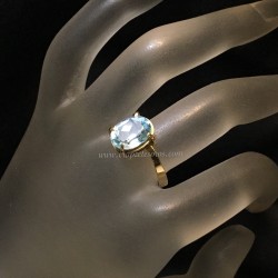 Intenso Topacio azul de Brasil en exclusivo anillo de oro de ley